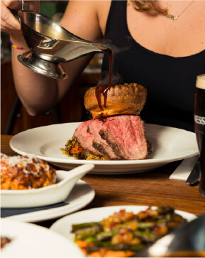 A woman enjoying a roast at Buyers Club