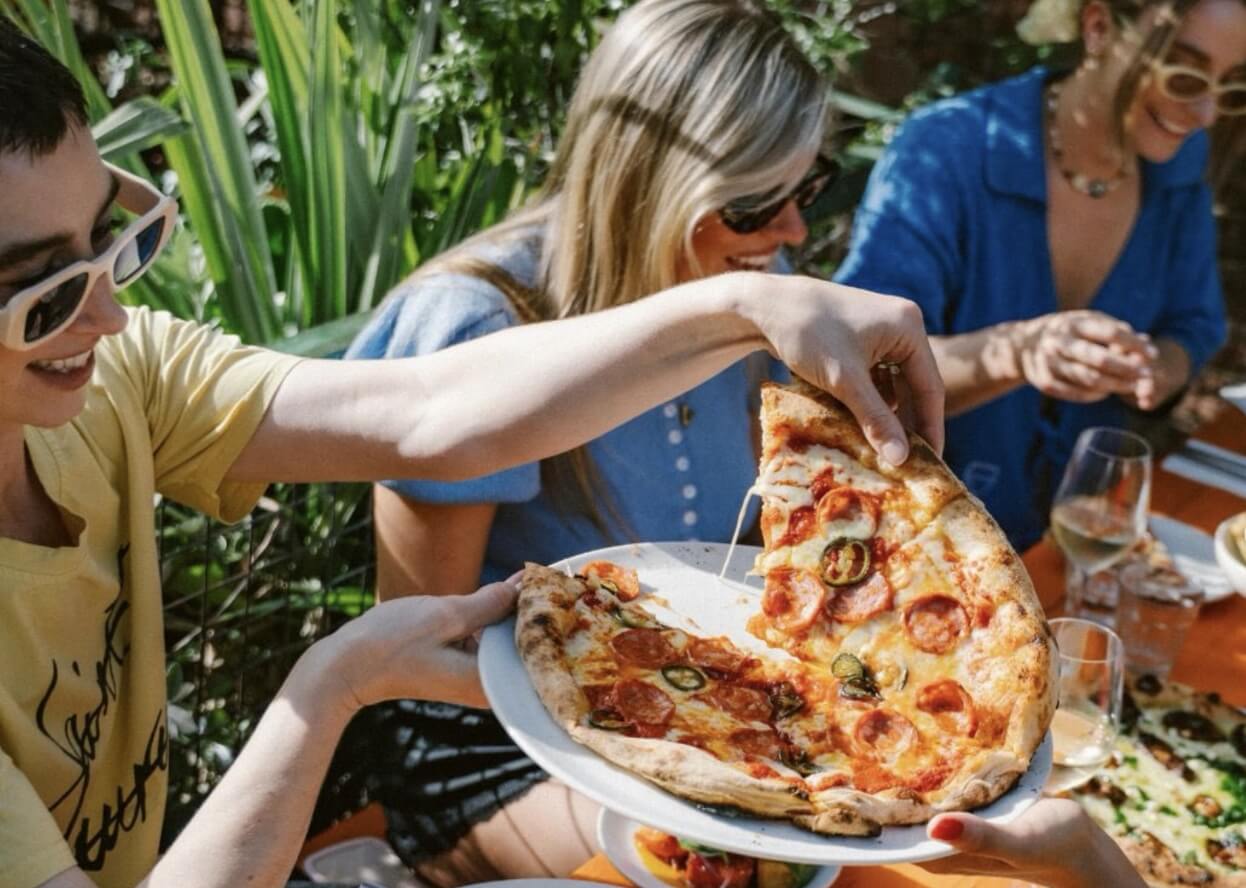 People enjoying food outside